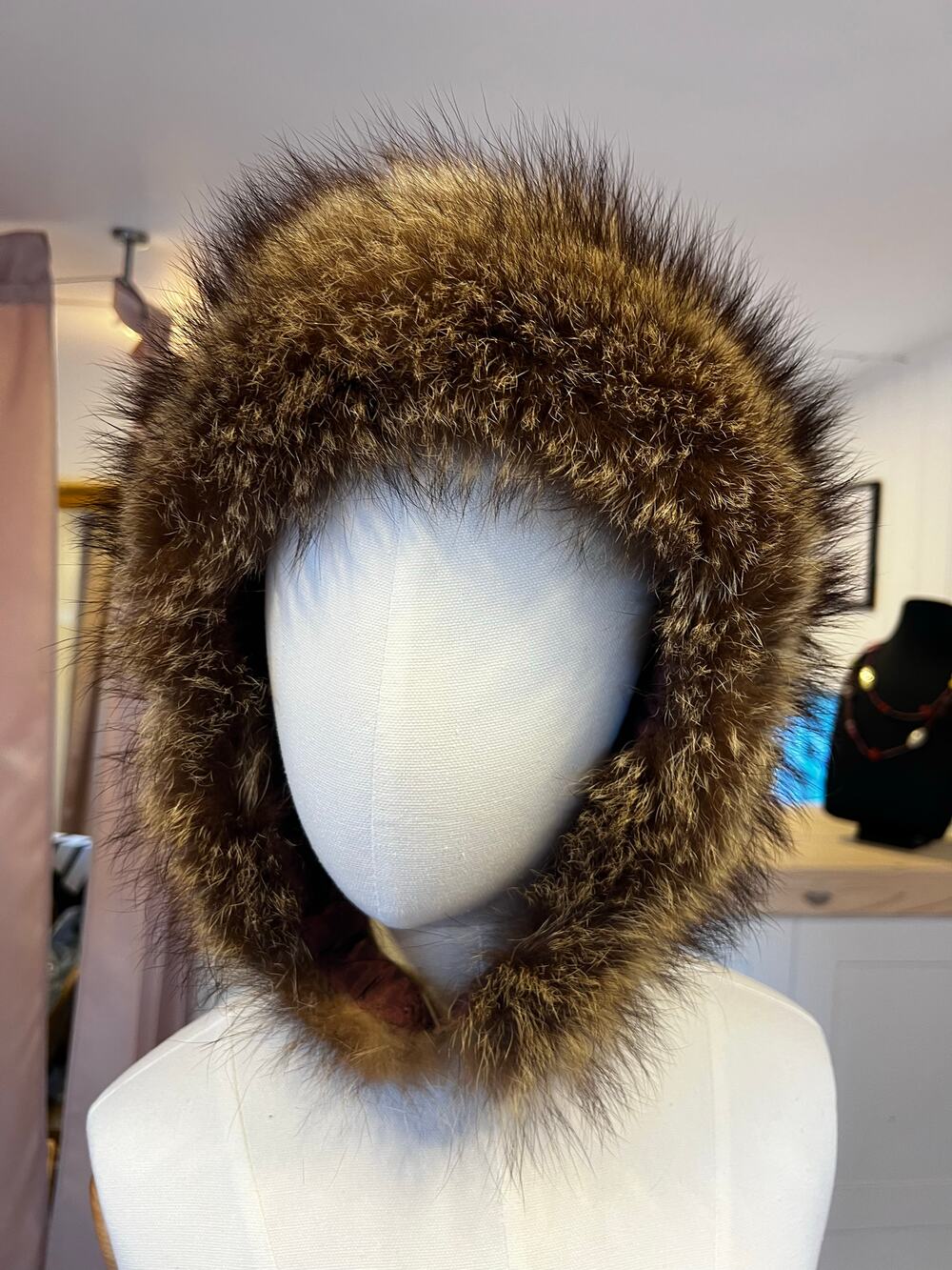 Brown fur trapper hat with ear flaps and quilted lining